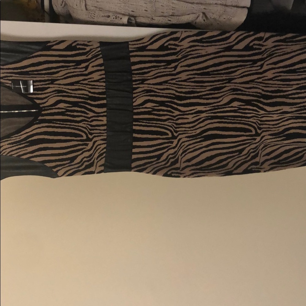 A leopard print dress never worn with tags